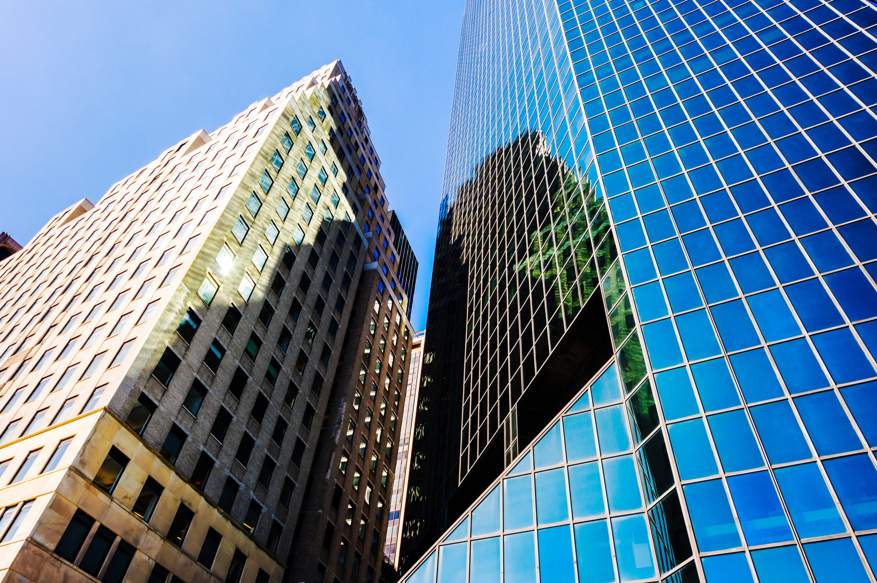 Office skyscraper sun new york financial district wallstreet